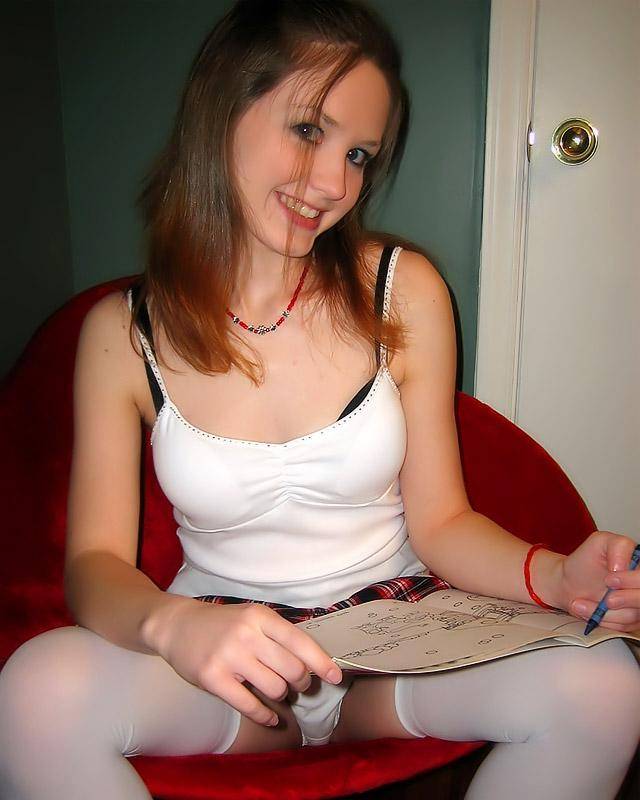 Pretty young girl in a mini-skirt shows her pussy 3 photo