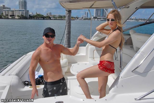 Bald guy fucked sporty girl on the high seas 5 photo