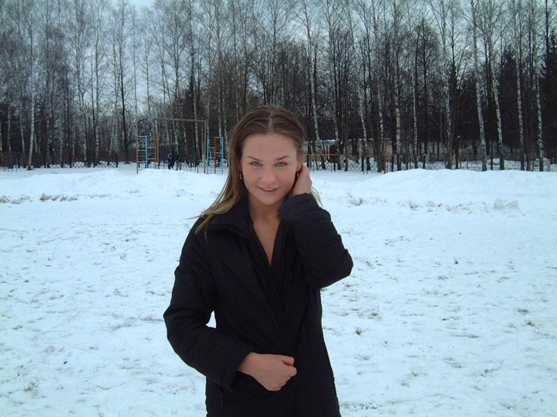 Football cheerleader stripped at the playground in the winter 1 photo