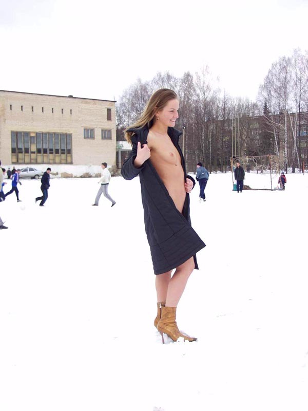 Football cheerleader stripped at the playground in the winter 8 photo