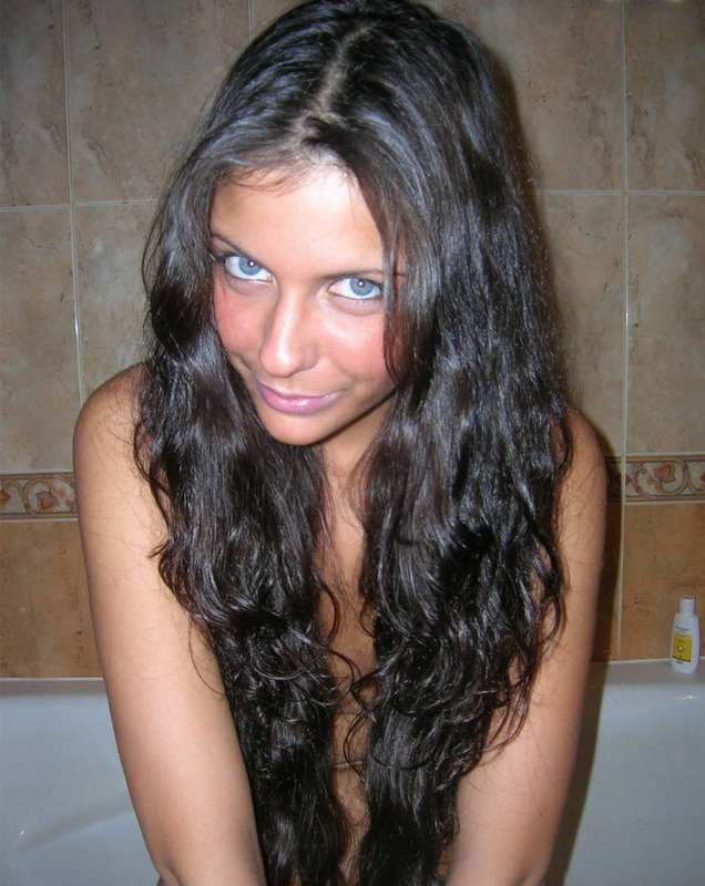 Blue-eyed attractive brunette completely naked 3 photo