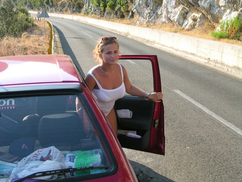 Couple without complexes rest on a wild beach 2 photo