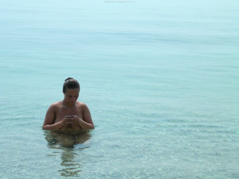 Couple without complexes rest on a wild beach 9 photo