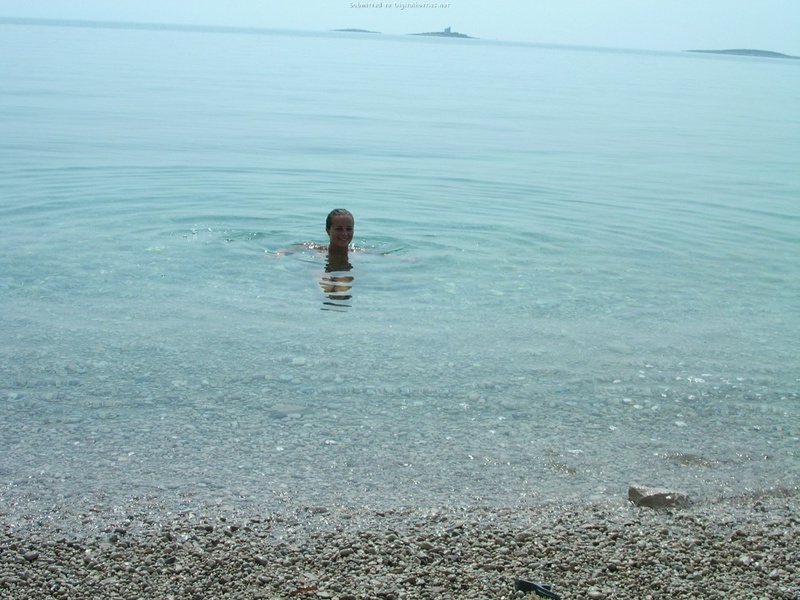 Couple without complexes rest on a wild beach 10 photo