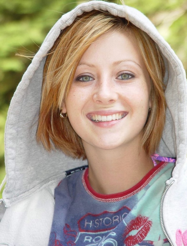 Green-eyed cutie on the rocky shore of the lake 1 photo